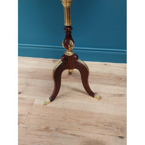 567 - Good quality mahogany and gilded brass world globe raised on turned column and three outswept feet {... 