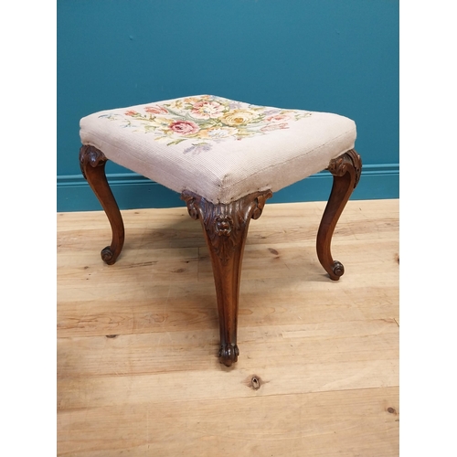 57 - 19th Carved oak stool with tapestry upholstered seat raised on cabriole legs {34 cm H x 54 cm W x 46... 