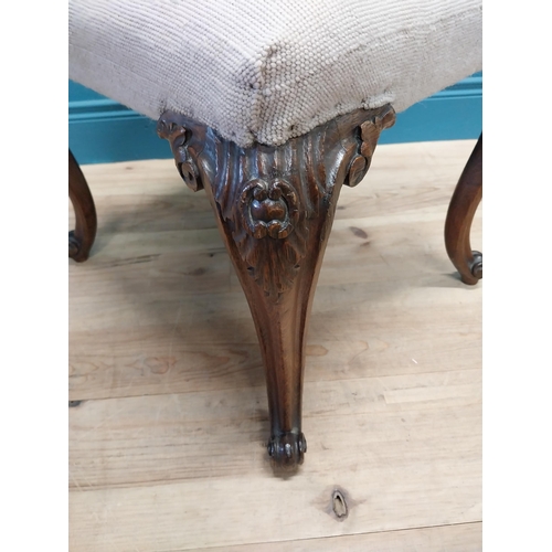 57 - 19th Carved oak stool with tapestry upholstered seat raised on cabriole legs {34 cm H x 54 cm W x 46... 