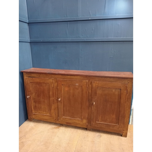 584 - Three door pine side cabinet {H 103cm x W 192cm x D 37cm }.