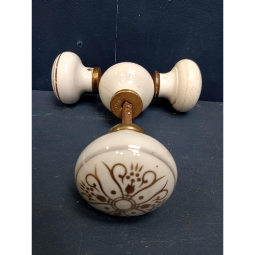 593 - Two pair of porcelain ceramic antique door handles with gold floral design {D 15cm x Dia 6cm}.