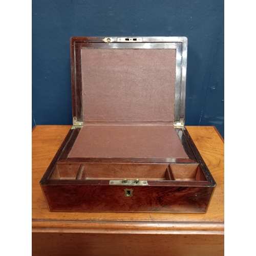 597 - Victorian brass bound rosewood writing slope. {H 11cm x W 30cm x D 22cm }.