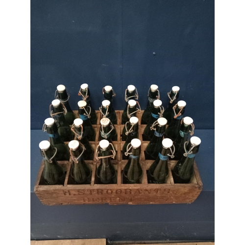 632 - Wooden crate with twenty four beer bottles swing top