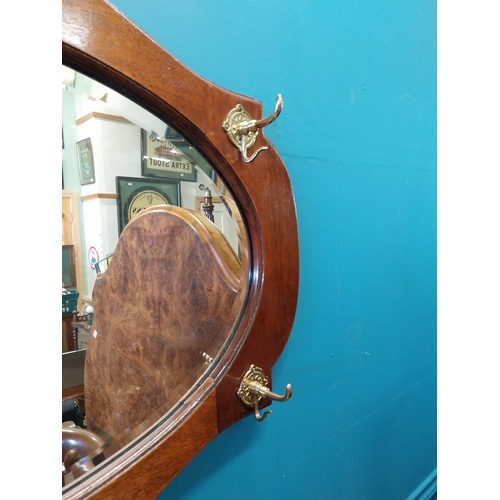 657 - 1950s mahogany hat and coat stand wall hanging mirror {62 cm H x 87 cm W x 10 cm D}.