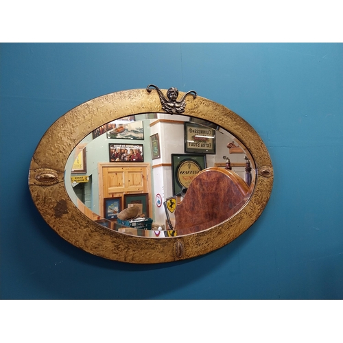 677 - Art Deco brass framed wall mirror {54 cm H x 80 cm W}.