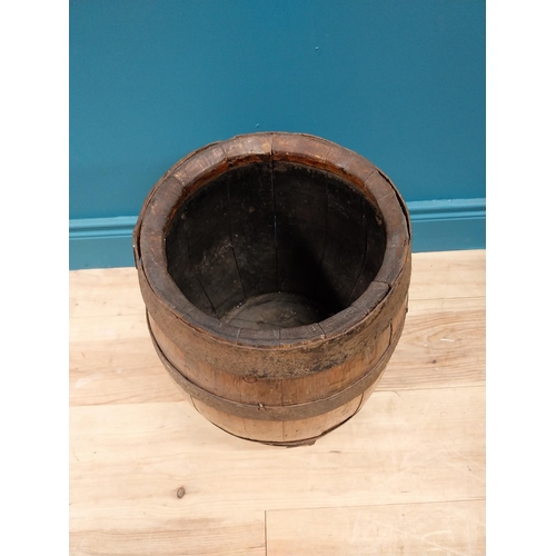 717 - Early 20th C. oak and metal bound log bucket {42 cm H x 34 cm Dia.}.