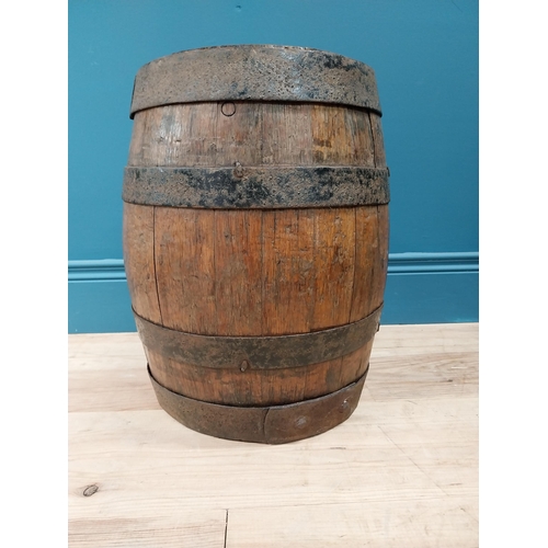 717 - Early 20th C. oak and metal bound log bucket {42 cm H x 34 cm Dia.}.