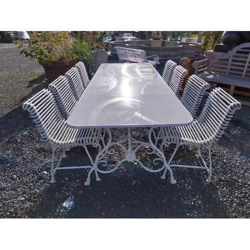 720 - Good quality hand forged wrought iron Arras style garden table and eight chairs. Table {72 cm H x 25... 