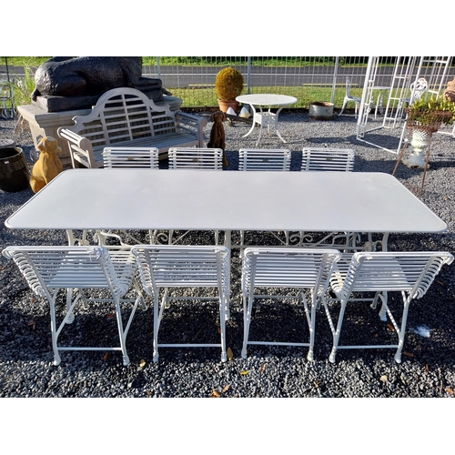 720 - Good quality hand forged wrought iron Arras style garden table and eight chairs. Table {72 cm H x 25... 