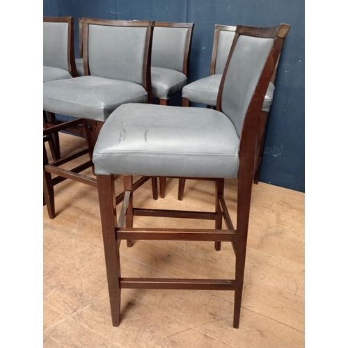 662 - Six blue leather wooden high stools with chrome footrest {H 104cm x W 47cm x D 44cm}.