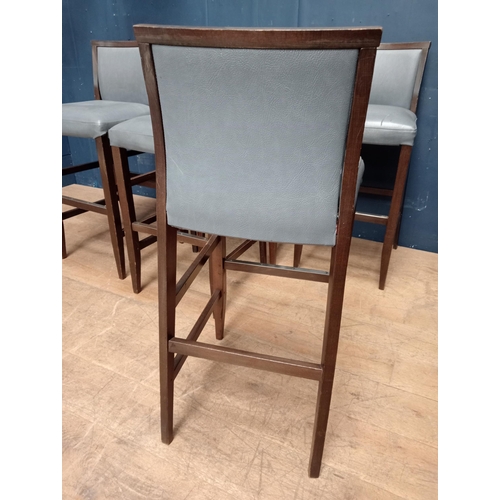 662 - Six blue leather wooden high stools with chrome footrest {H 104cm x W 47cm x D 44cm}.