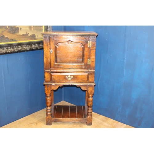 666 - 18th C. side cabinet with single panel door over single drawer. {H 114cm x W 62cm x D 40cm}.