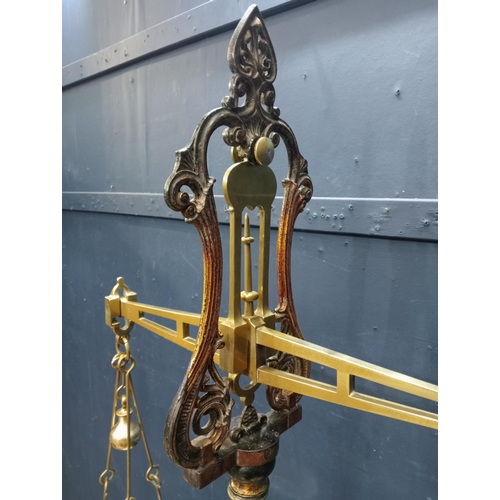 668 - 19th C. Cast and brass Grocer's scales {H 200cm x W 80cm x D 35cm}.