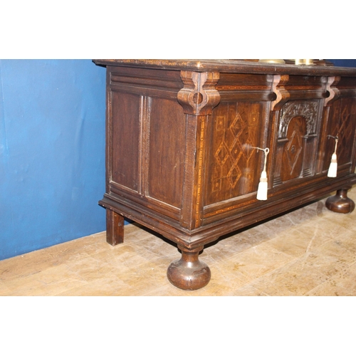 669 - 19th C. Oak carved two door dresser with inlaid doors and open shelves on turned columns supports. {... 