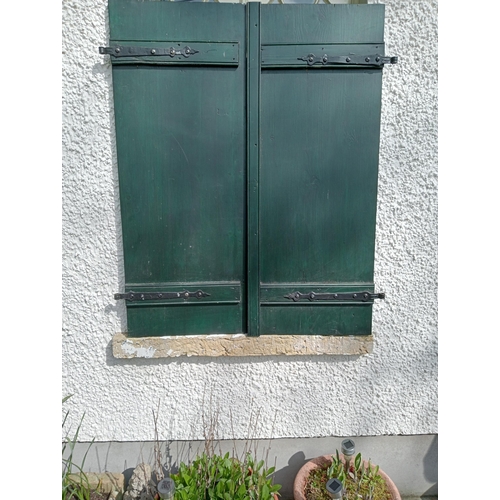 680 - Pair of French style green window shutters {H 124cm x w 102cm x D 5cm}.