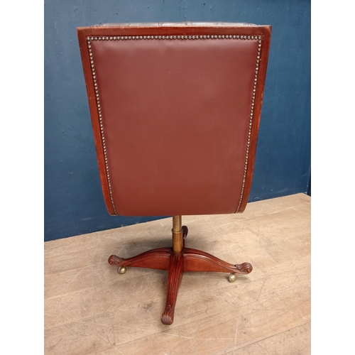 683 - Red leather deep button swivel office chair {H 113cm x W 63cm x D 65cm}.