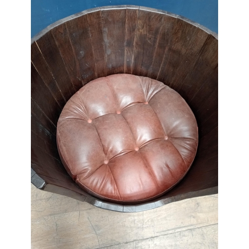 689 - Barrel style dog bed with brass straps with lions feet and leather cushion {H 66cm x Dia 80cm}.