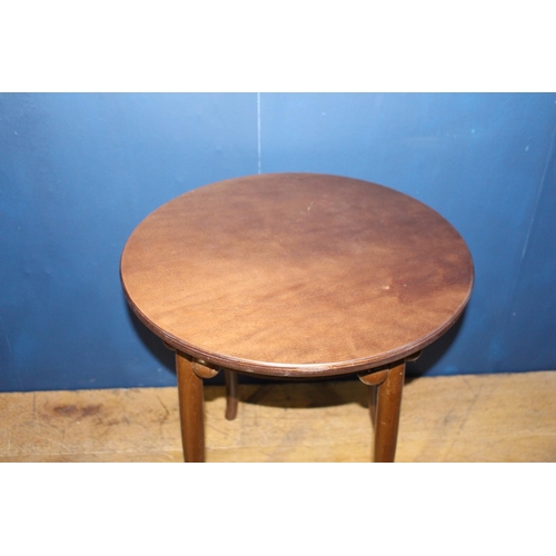 694 - Bentwood bar table on four outswept feet {H 54cm x Dia 41cm
Two one after another and one later}.