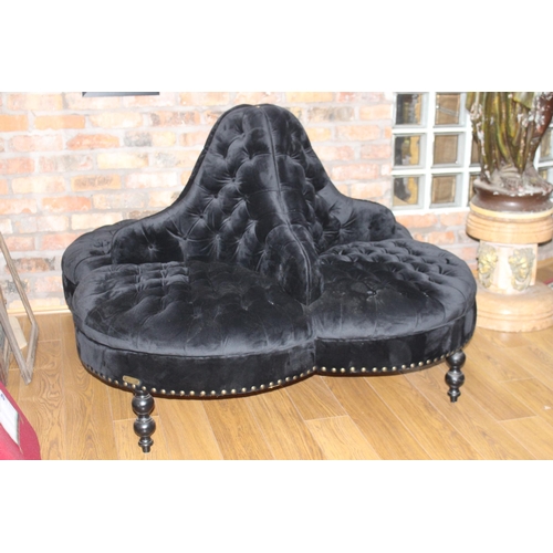 695 - Four seater deep button conversation seat on turned legs with black velvet upholstery {H 100cm x W14... 