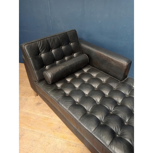 696 - Black deep button chaise lounge on four turned legs {H 81cm x W 160 x D 80cm}.