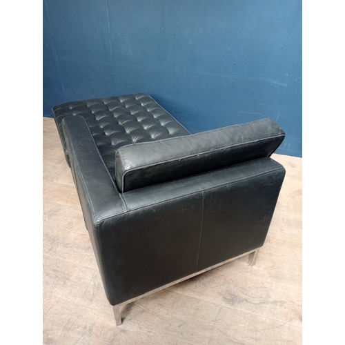 696 - Black deep button chaise lounge on four turned legs {H 81cm x W 160 x D 80cm}.