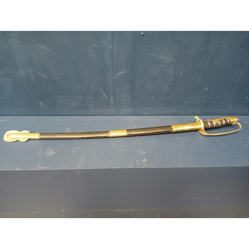 711 - Brass and metal military sword