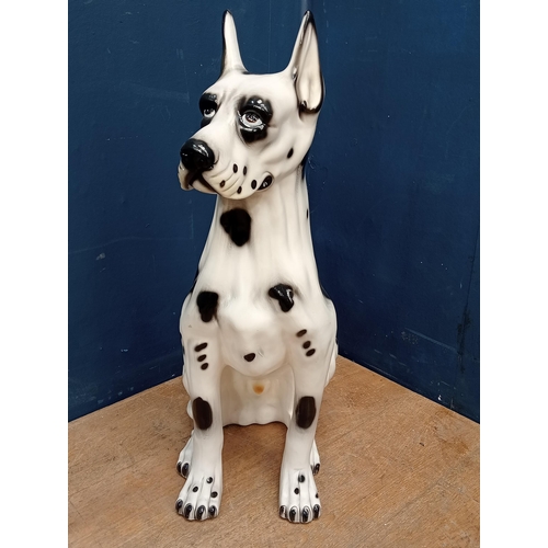 753 - Ceramic seated Dalmatian dog {H 74cm x W 50cm x D 30cm}.