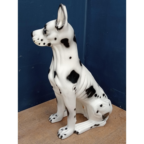 753 - Ceramic seated Dalmatian dog {H 74cm x W 50cm x D 30cm}.