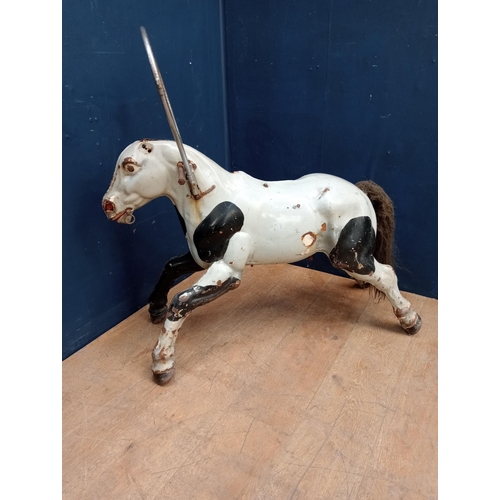 755 - Child�s metal carousel horse {H 95cm x W 40cm x D 100cm}.