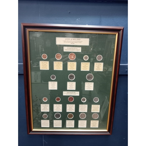 761 - Framed montage of Coins of Ireland 1928-2001 {H 56cm x W 46cm}.