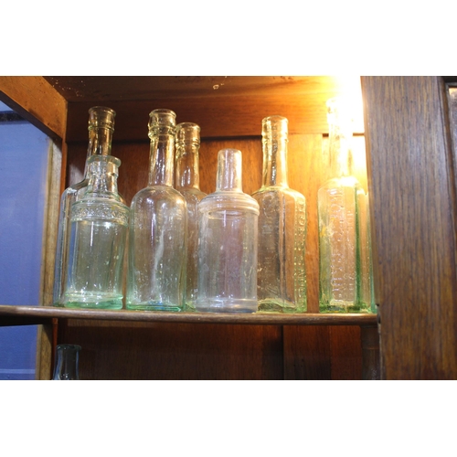 762 - 19th C. Collection of twenty  glass sauce bottles {Tallest H 19cm down to H 14cm}.