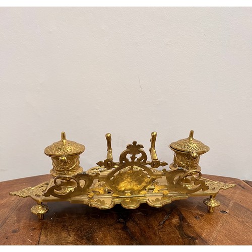 141 - Decorative Brass desk set with ceramic inkwells.  {H 14cm x W 39cm x D 19cm }.