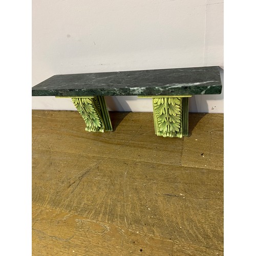 202 - Green marble shelf decorated with acanthus leaves corbels. {H 23cm x w 50cm x d 13cm }.