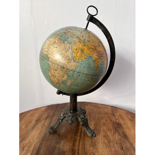 613 - Victorian World globe on cast iron base {H 62cm }.