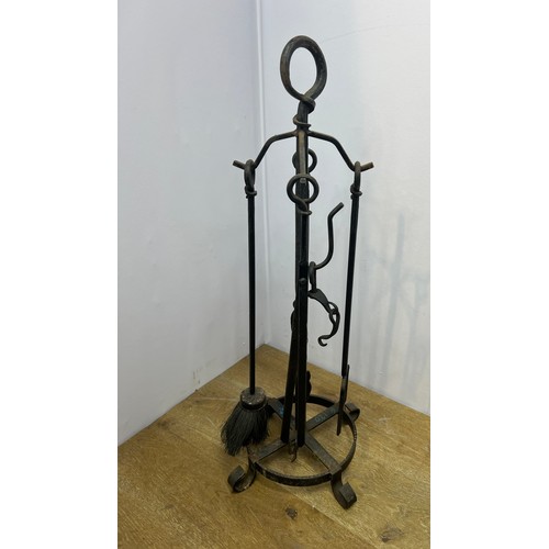 658A - Wrought iron companion set.