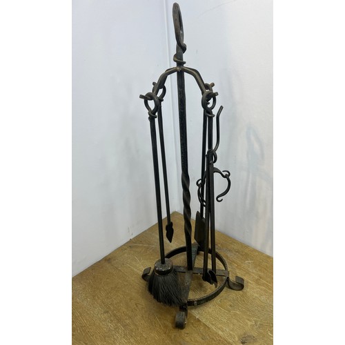 658A - Wrought iron companion set.