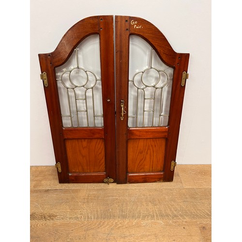 455 - Pair of mahogany saloon bar doors with brass handles and fixtures leaded bevelled glass  {one door- ... 