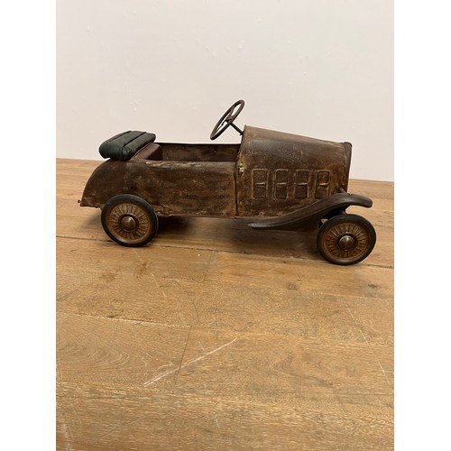 679 - 1940's tinplate children's pedal car { H 50cm x W40cm x L 95cm}.