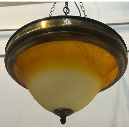 718 - Brass rim hanging uplighter with amber  shade {H 18cm x dia 39cm}.