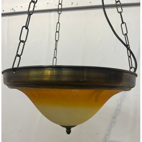 718 - Brass rim hanging uplighter with amber  shade {H 18cm x dia 39cm}.