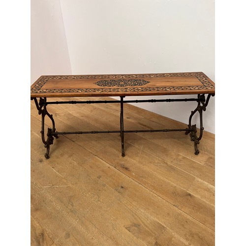 746 - 20th C. Cast iron scroll base teak wood table with three scrolled legs and single stretcher {H 75cm ... 