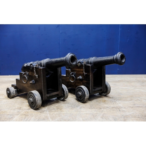 403 - Pair of 19th C. Cast iron deck cannons. {H 61cm x W 39cm x D 73cm }.