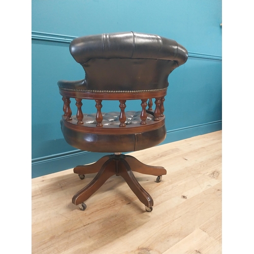 1143 - Good quality deep buttoned leather and mahogany Captain's swivel office chair. {86 cm H x 64 cm W  x... 