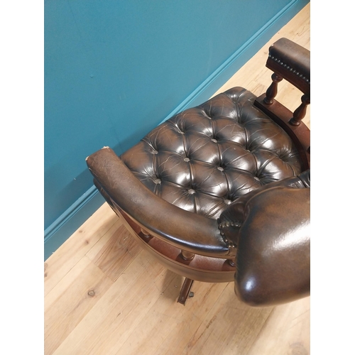 1143 - Good quality deep buttoned leather and mahogany Captain's swivel office chair. {86 cm H x 64 cm W  x... 