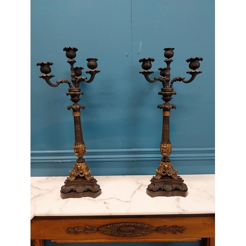 104 - Pair of exceptional quality 20th C. four branch bronze candelabras decorated with shell and ladies m... 