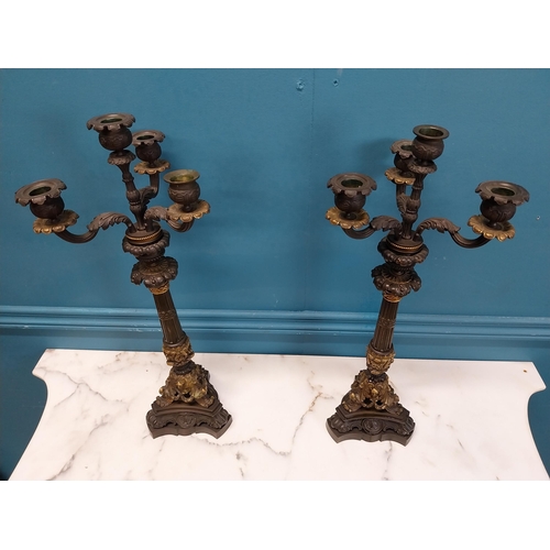 104 - Pair of exceptional quality 20th C. four branch bronze candelabras decorated with shell and ladies m... 