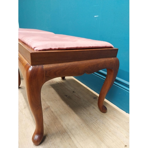 107 - Pair of mahogany stools with upholstered seats on cabriole legs. {35 cm H x 44 cm W x 36 cm D}.