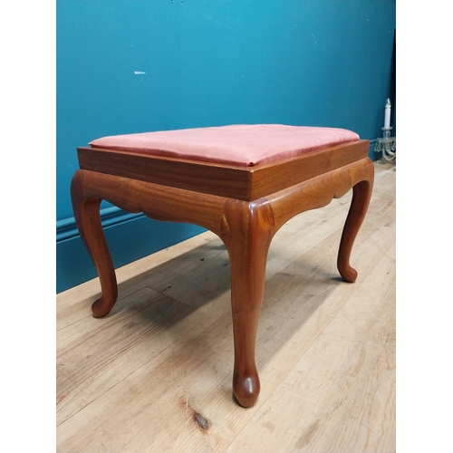 107 - Pair of mahogany stools with upholstered seats on cabriole legs. {35 cm H x 44 cm W x 36 cm D}.