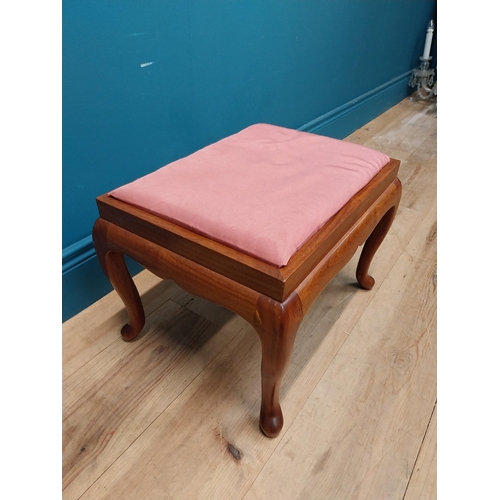 107 - Pair of mahogany stools with upholstered seats on cabriole legs. {35 cm H x 44 cm W x 36 cm D}.