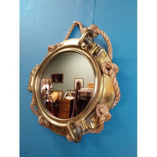 123 - Brass ship's porthole in the form of mirror with rope decoration stamped J J Woods Rainhill. {40 cm ... 